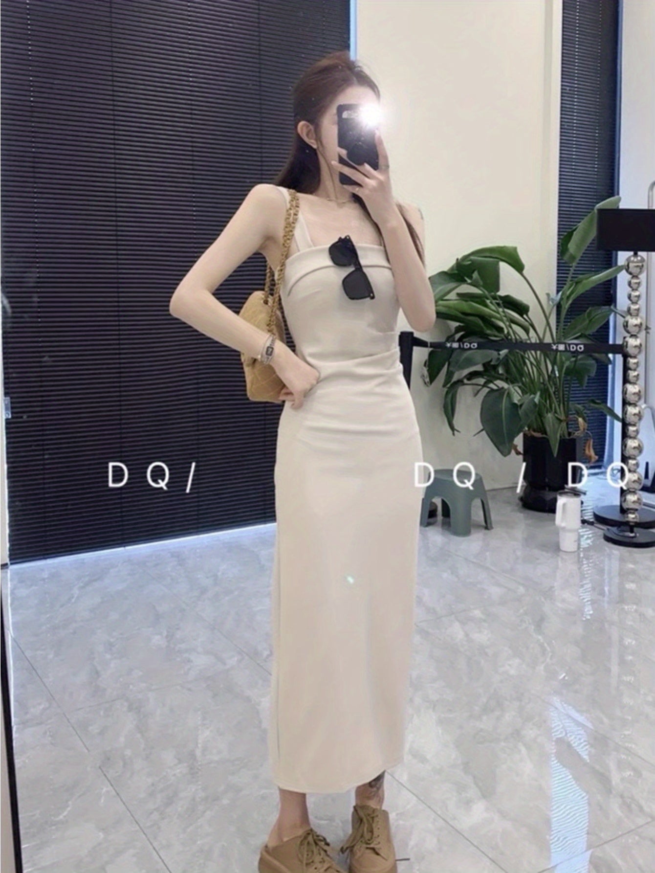 Retro solid color waist bottom suspender dress women's 2024 summer new design sense slim and thin hip skirt
