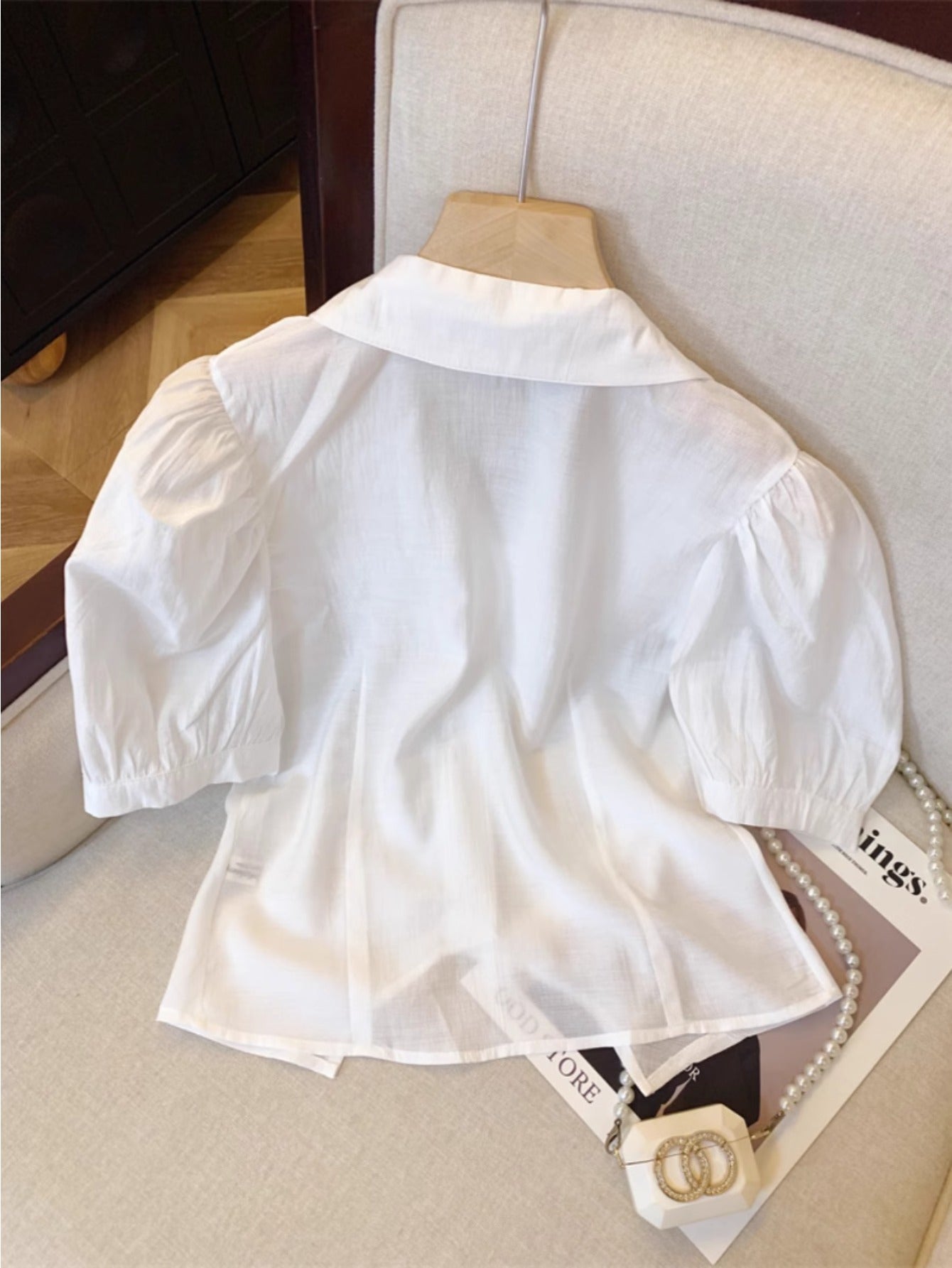 White lapel bubble sleeve shirt women's summer French three-dimensional rose splicing shirt unique split-ended sweet and spicy top