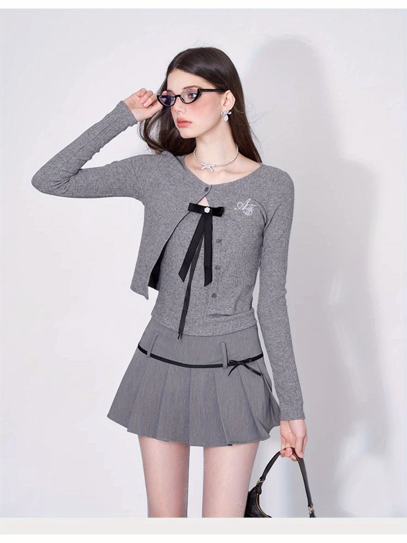 Bow hanging two-piece set/pleated skirt without cardigan