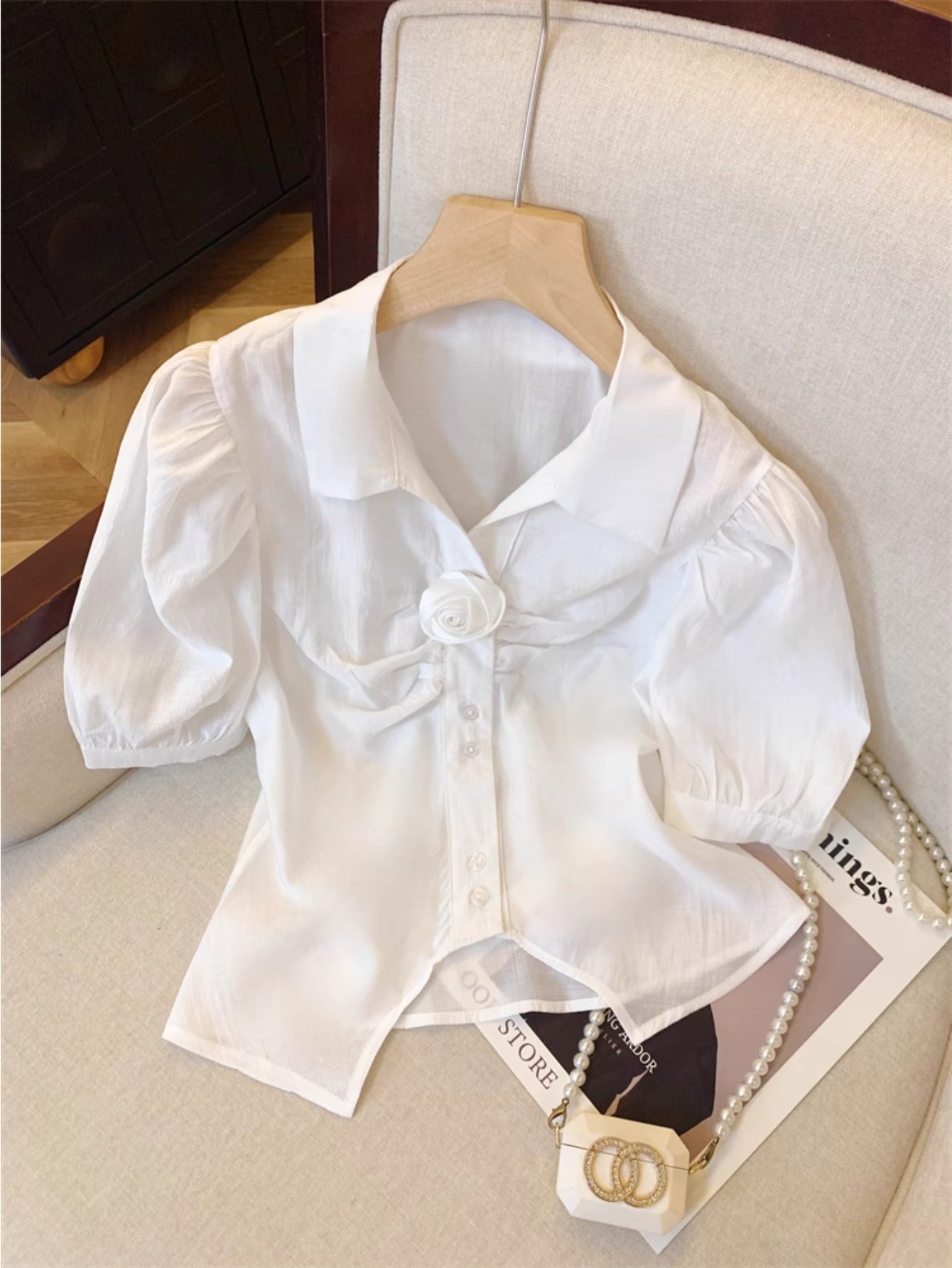 White lapel bubble sleeve shirt women's summer French three-dimensional rose splicing shirt unique split-ended sweet and spicy top
