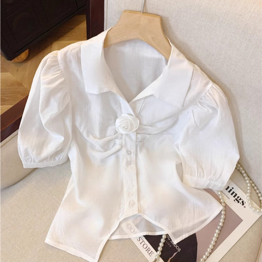 White lapel bubble sleeve shirt women's summer French three-dimensional rose splicing shirt unique split-ended sweet and spicy top