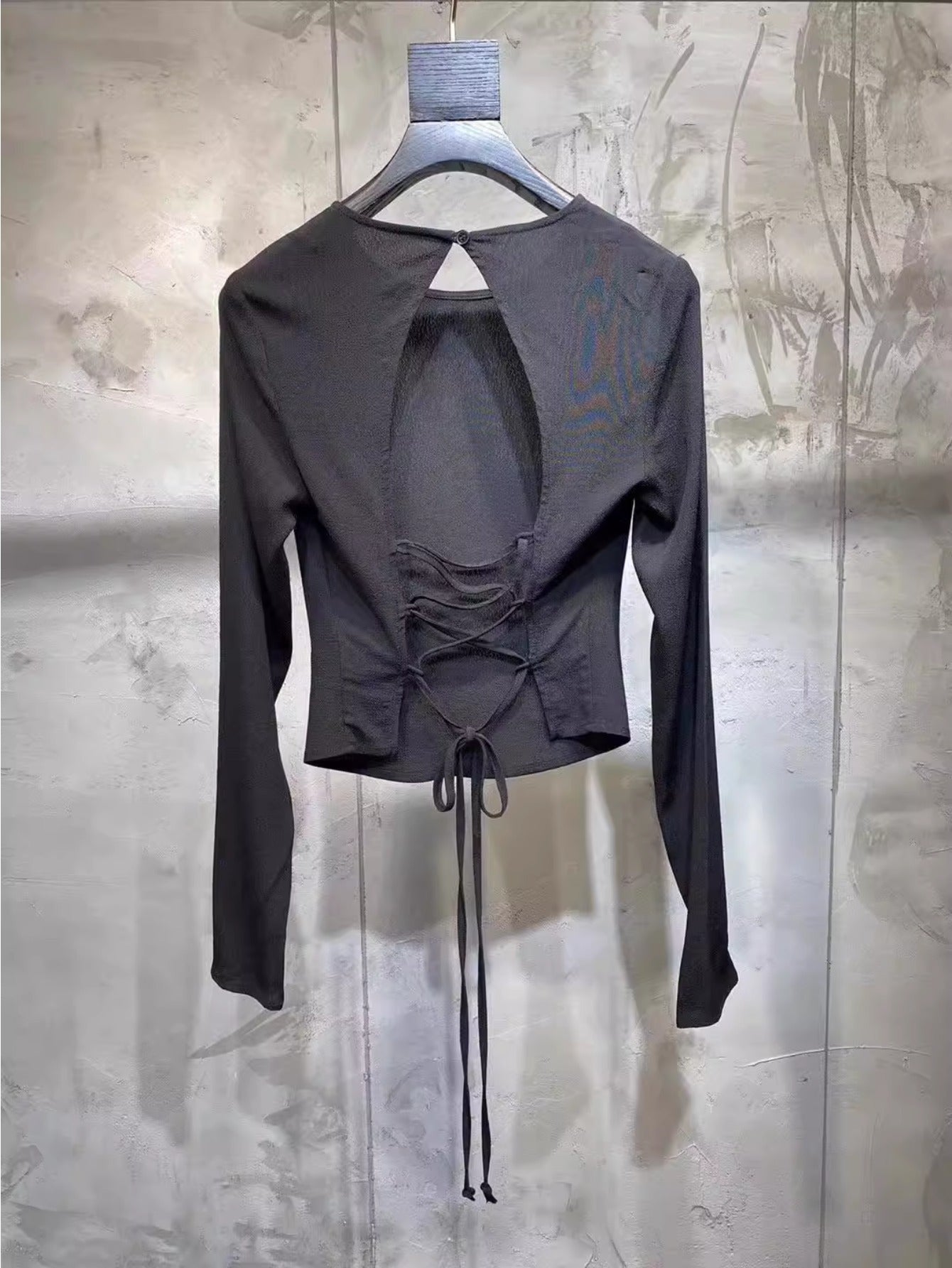 European station one-word collar halter long-sleeved T-shirt women's 2024 autumn sexy tight European and American slim black top women's trend